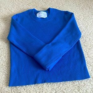 This is a indigo,cropped,long sleeve top.From Zara
